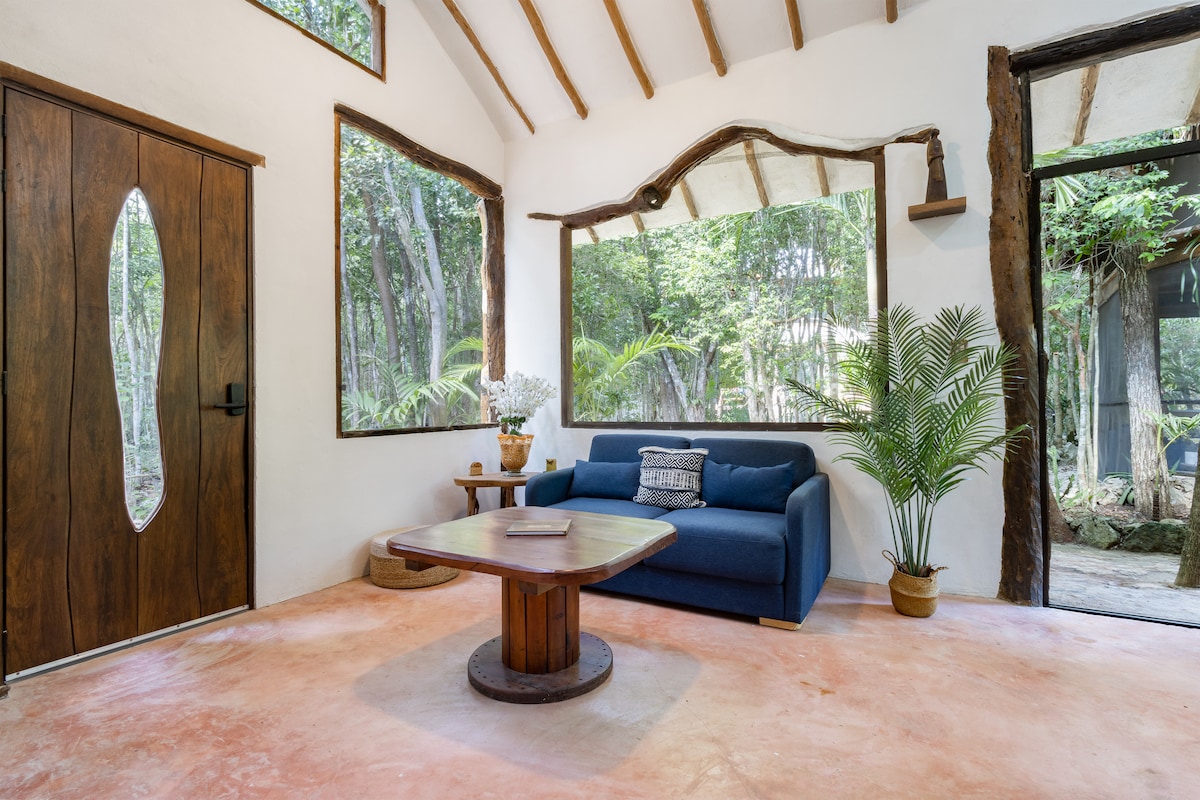 Relax, Recharge, and Revel in Jungle Bliss inside the Casa's living room.  Sofa folds out into a double bed