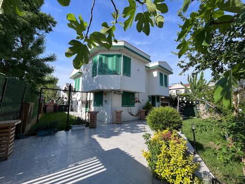Green Blinds and Garden Villa
