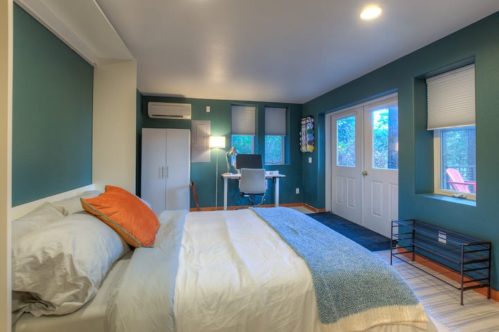 Basement Murphy bed and en-suite bathroom. Lockable interior and exterior doors for privacy. Dedicated work space. Doors lead to firepit and hot tub.