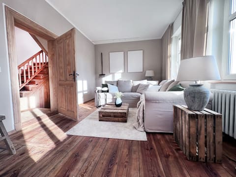 Popular Airbnb listing: Farmhouse & remise with fireplace, sauna & garden in Potsdam Mittelmark