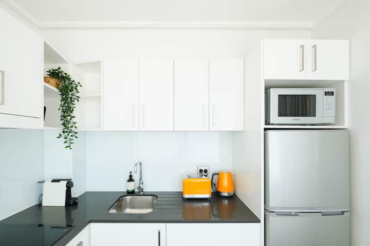Fully equipped kitchen with Nespresso coffee machine.