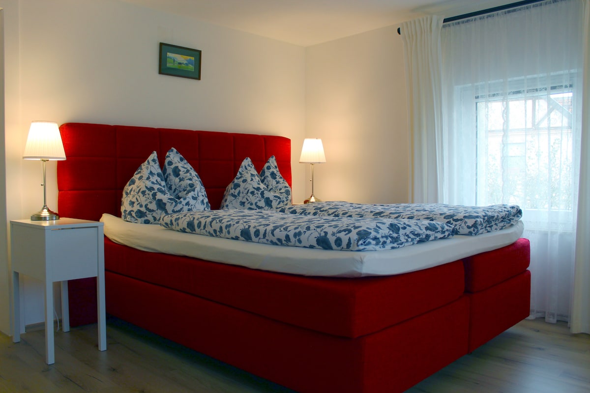 Bedroom 1  with box spring double bed upstairs