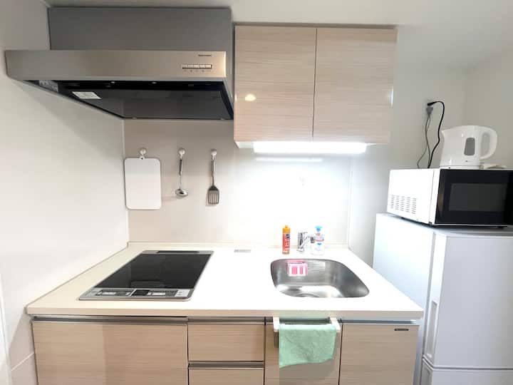 Simple kitchen space to meet basic living needs.