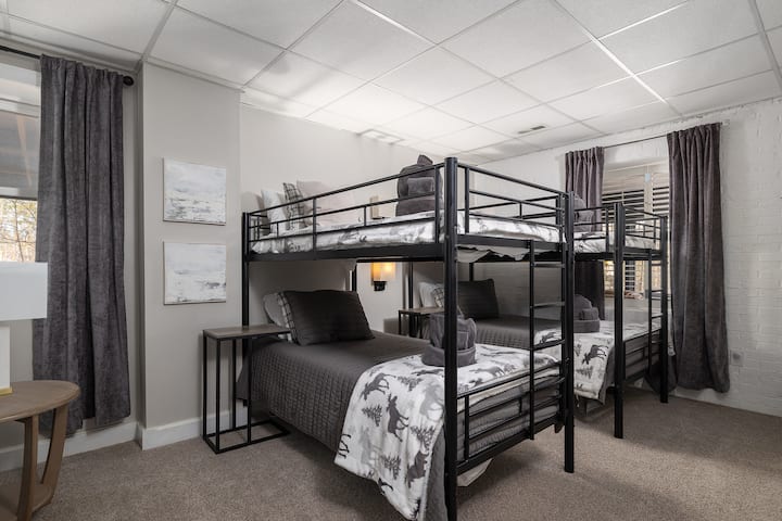 The MOOSE ROOM is a bunk room that comfortable for adults and children, a beautiful new vanity and a chair for reading.  Large closet for all your clothes!