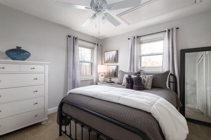 The queen bed upstairs has its own bathroom and loft for those times you need a little space.  There are two large closets.