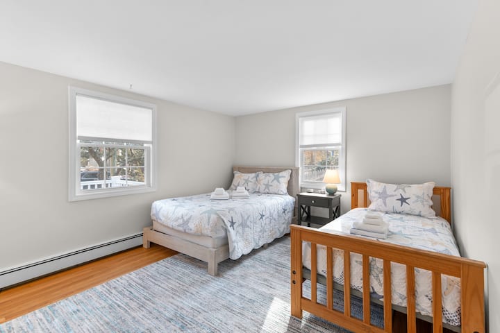 Main floor bedroom two: one full bed and one twin bed
