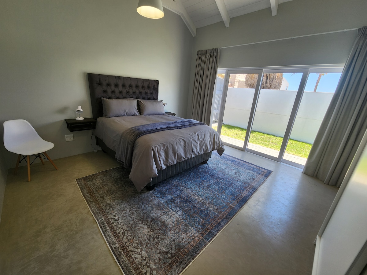 Área 1
Dormitorio 2