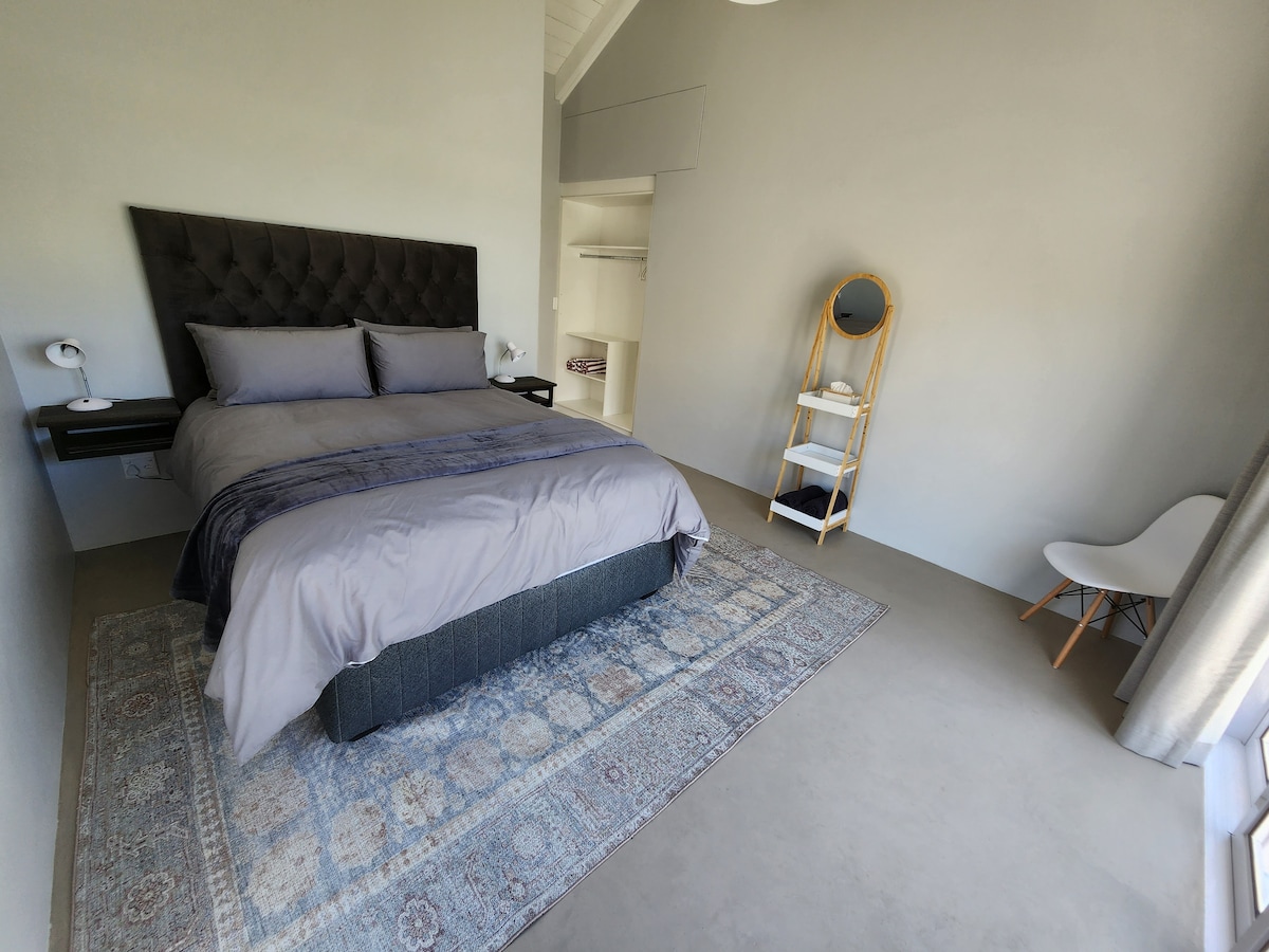 Área 1
Dormitorio 1 