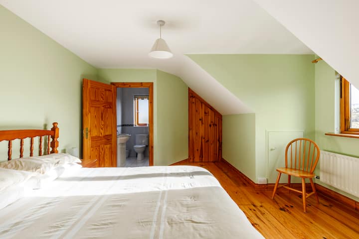 Bedroom 3, back upstairs bedroom with king-size bed and ensuite.Built In Wardrobe. Chest of Drawers