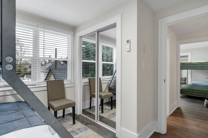 Bedroom (three) upstairs has mirror doors on a slider closet doors.