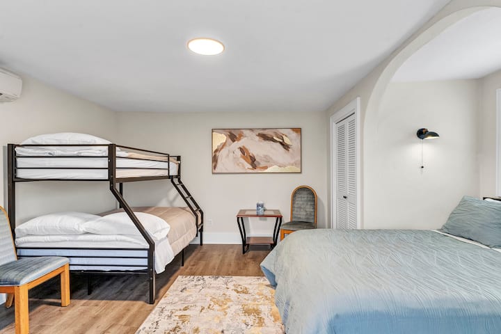 Large upstairs room Queen bed, with double bed full/twin.