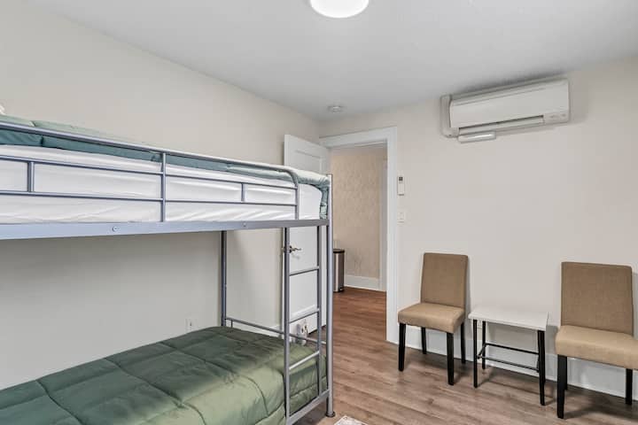 Bedroom (four) upstairs has 2 twin beds and each room upstairs includes mini split HVAC system.