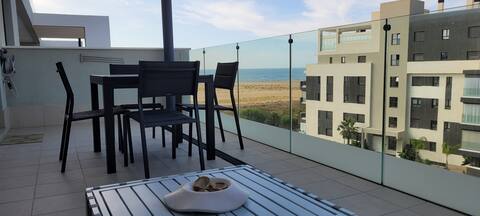 Spacious beachfront 2 bedroom apartment
