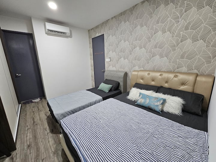 Bedroom 1 - 1queen bed, 1 single bed. They can be pushed together if you have kids.