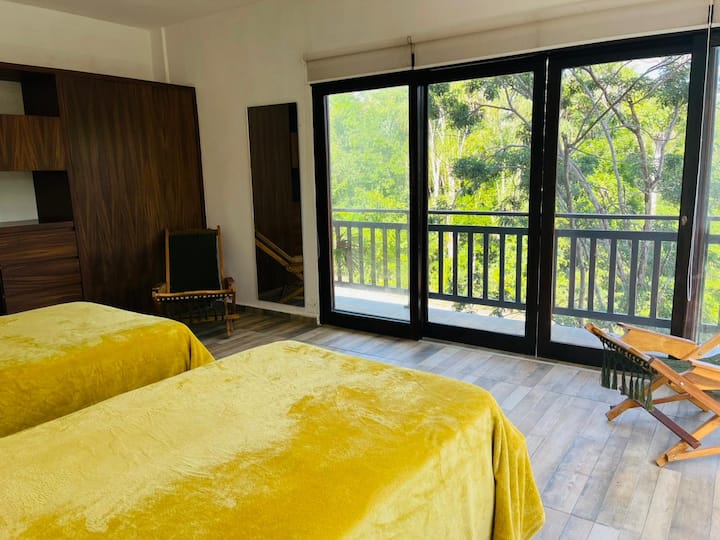 Habitacion con dos camas individuales /
Habitación con dos camas individuales