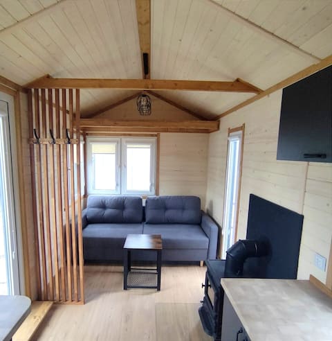 Tiny house: sleep among the sheep