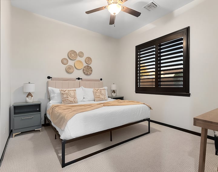 Main level king bedroom with Roku TV