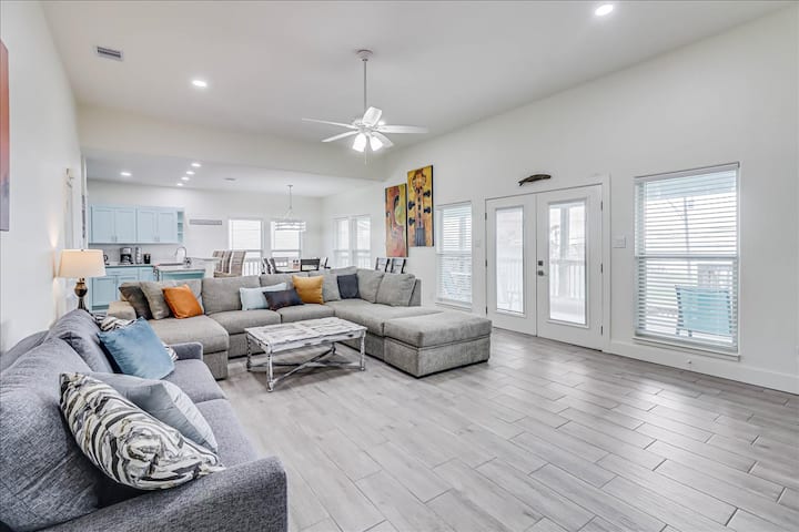 Open Concept Living room, Dining & Kitchen. Tons of natural light. Dining table seats 8 plus seating for 4 at the kitchen counter