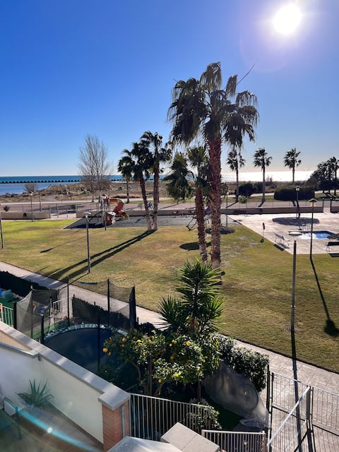 in front of the beach and community area