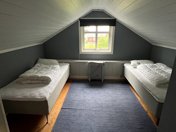 Chambre avec 2 lits simples