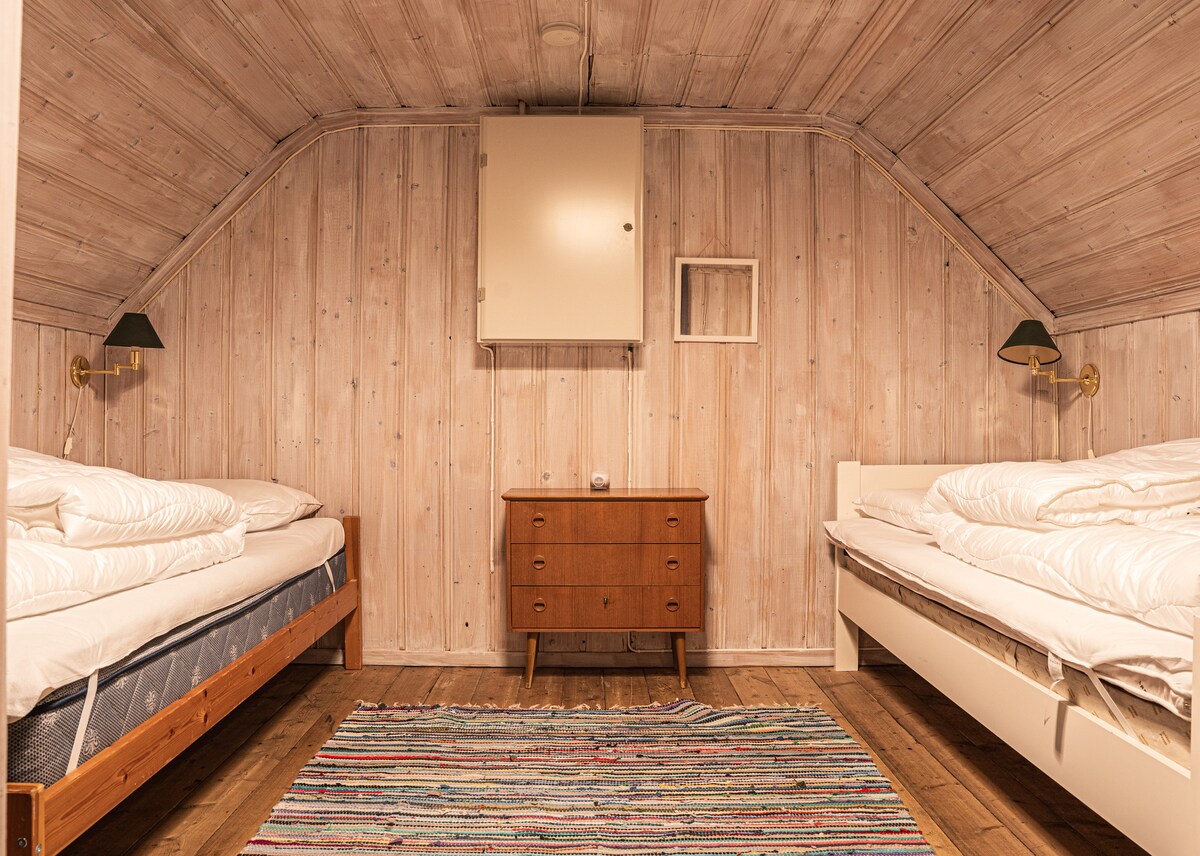 Dormitorio con dos camas individuales. 