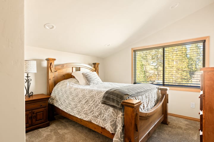 The second bedroom featuring a queen size bed.
