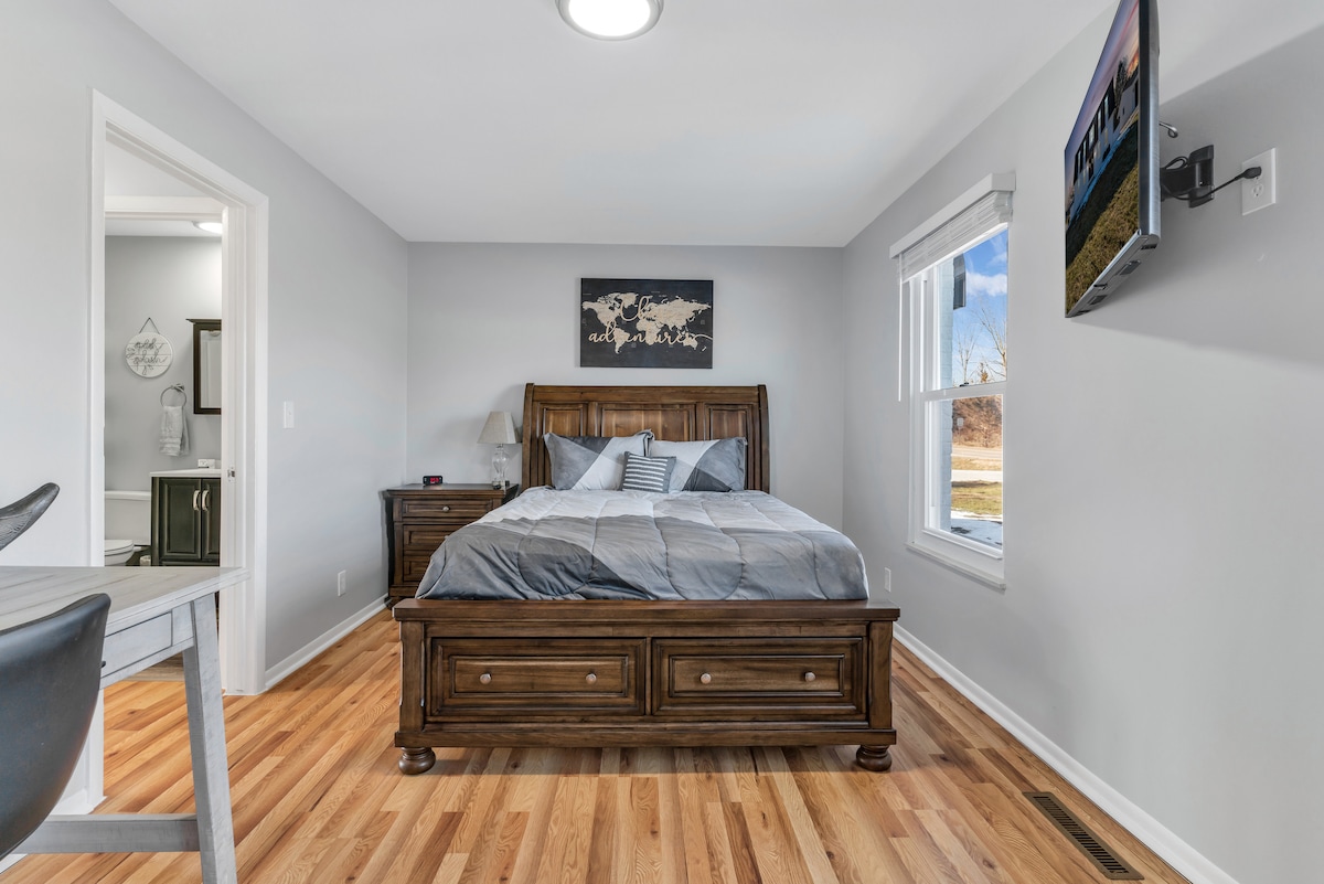 Main bedroom has a queen size bed and plush linens.  We've also created a workspace away from the main living areas in the cozy suite.