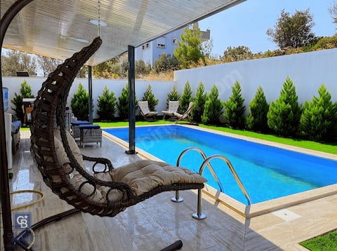 Brand new house with pool, sauna and hot tub.