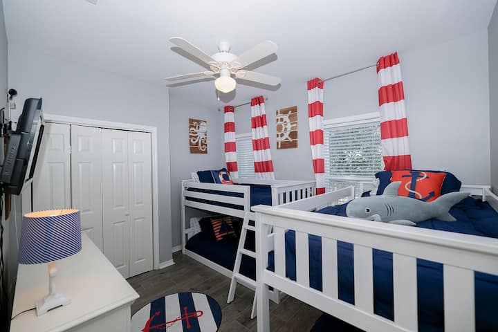 Our 2nd-floor bunk room features 2x sets of bunk beds (each bed is a twin), a full closet, a dresser, a new Smart TV, and an Xbox-One gaming system so the kids can relax and have fun after a day at the beach. 