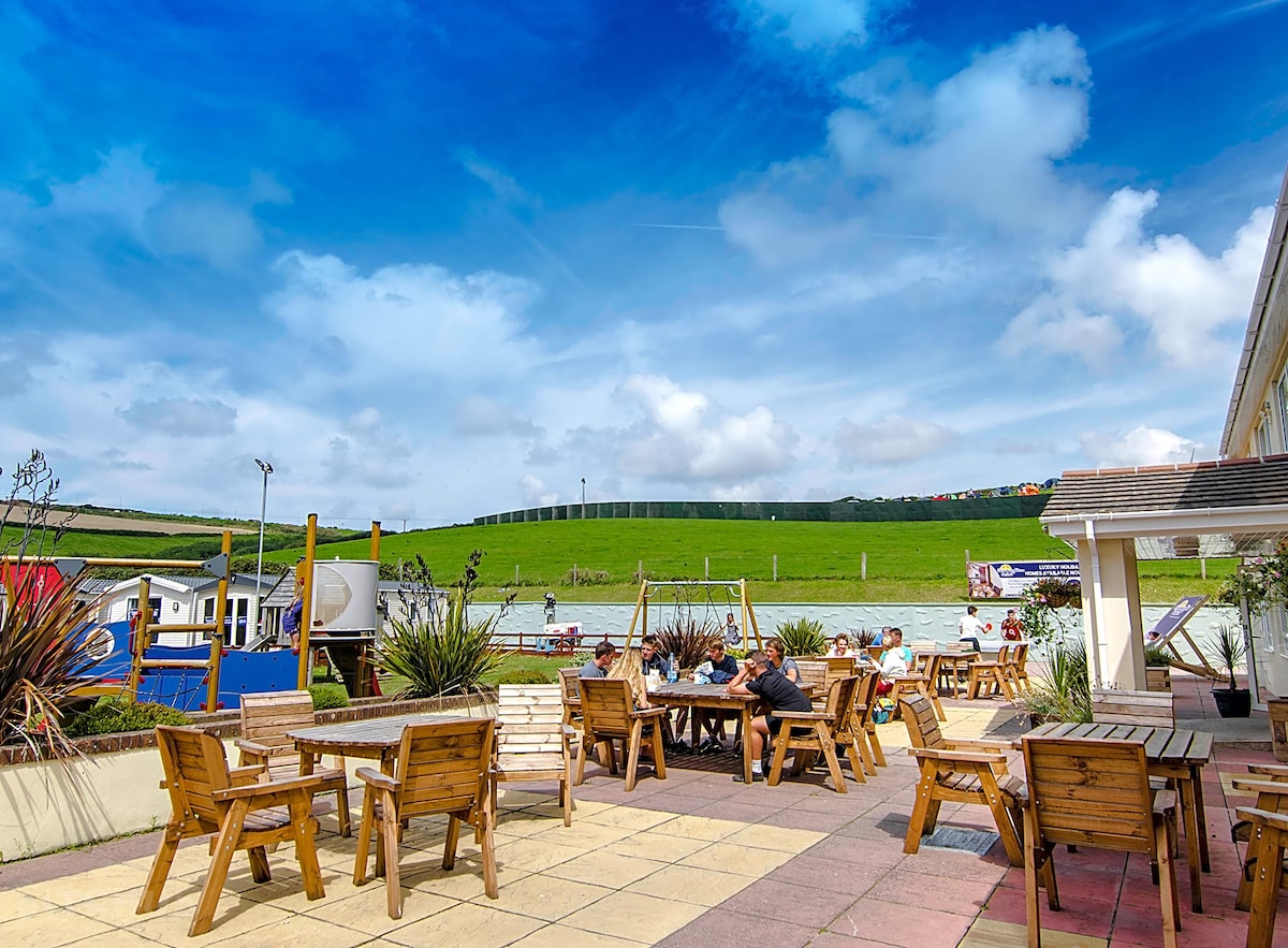 Outside adventure park and seating at Newquay Bay Resort.