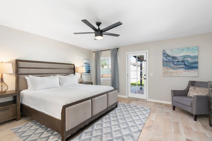 Primary suite overlooking backyard