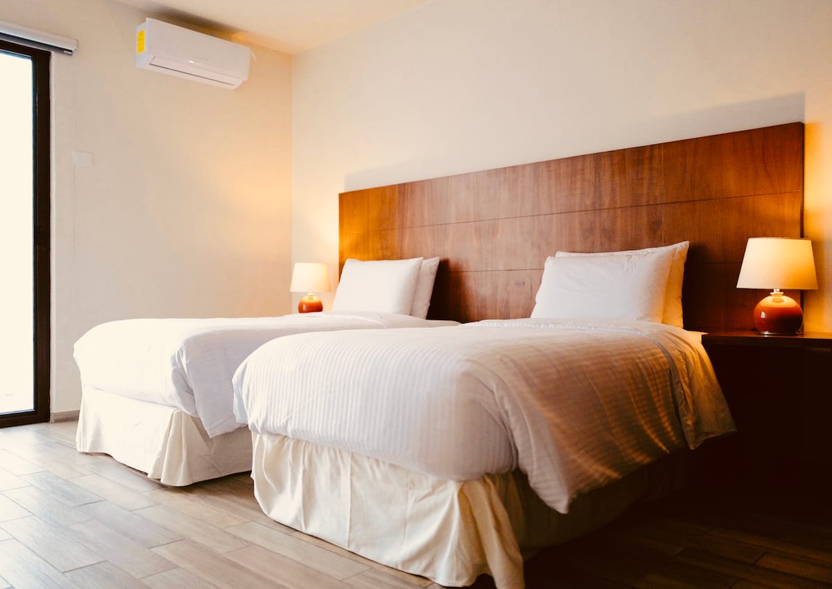 Master bedroom with King bed and air conditioning