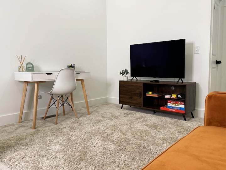 Upstairs common area has a work station, a TV, many games for kids and adults, coloring supplies, kids books, and a couch that can be unfolded to XL twin sleeping space (our 8th sleeping spot).