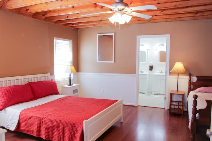 Big Cabin - Bedroom 2 
Queen bed plus separate twin bed.  Complete with connected full bathroom with tub and double sinks.