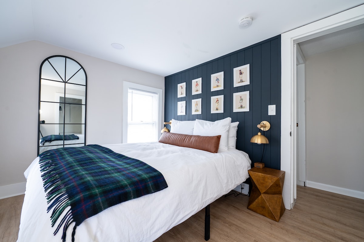 Bedroom 3 on second floor with queen bed. All upstairs bedrooms are equipped with 4 USB/ 4 outlet power strips on each bedside table. 