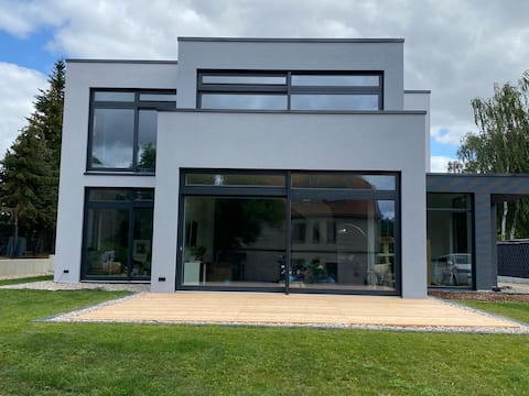 Vacation home in architect-designed house with garden, pool