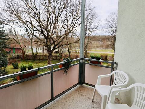 Furnished apartment with balcony & water view