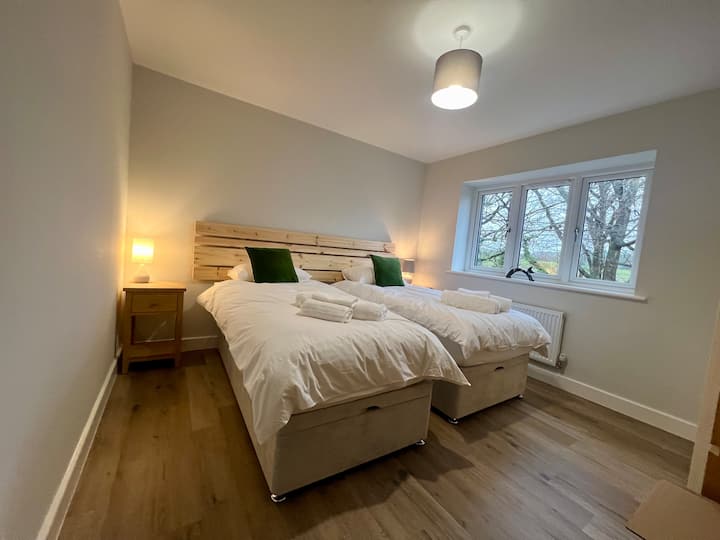 Bedroom 4. Can be made up as 2 singles or zipped together to make a 6ft double.  Fitted shutters installed since photo was taken. 
Note - bedroom 3 photo to follow but is same size as bedroom 4 (c13sqm) with King Size 5ft bed.