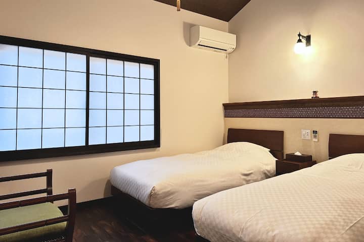2nd bedroom with two single size beds