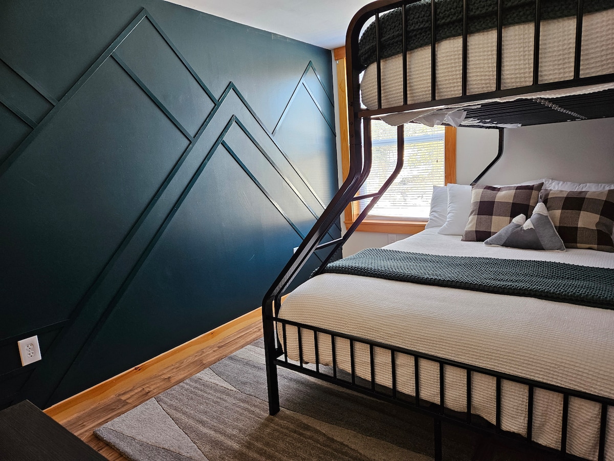 Enjoy the comfort of a Queen with Twin XL bunk for the kids