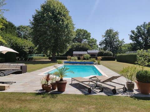 West Sussex home with heated pool & tennis court