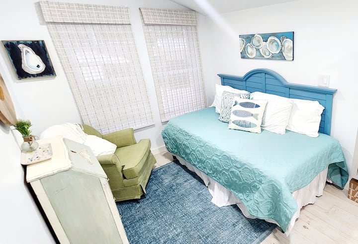 Twin XL memory foam bed, cozy sitting area by window, and chest of drawers. 

Please note: This room, is separated from rest of home by a wall and a Portiere curtain. 