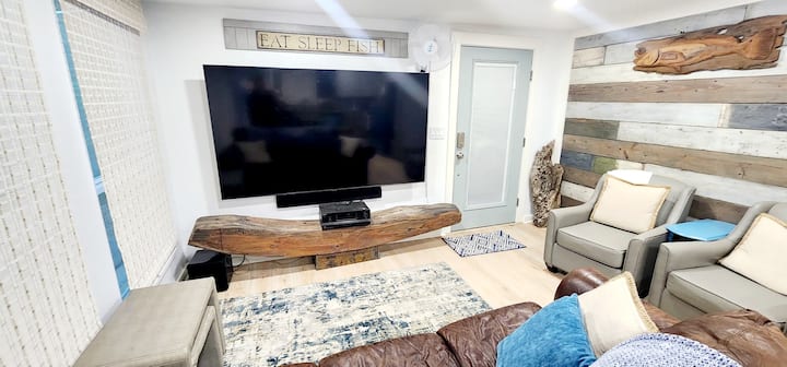 Large TV with 5.1 surround sound. YoutubeTV and other streaming services offered.