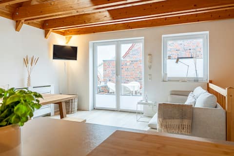 Top performing Airbnb: Stylish "Fischreiter" apartment building in Esens. in Esens