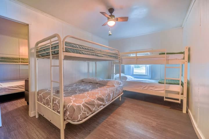 Full size bed with 3 twin bunks
