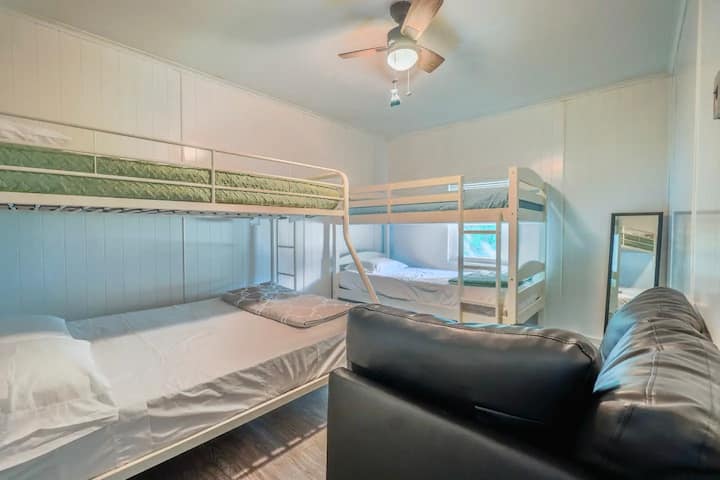 Full size bunk with Twin above and a Twin with a Twin above