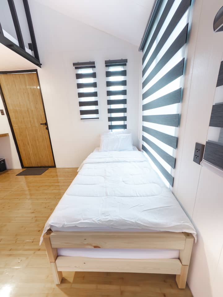 This is two (2) single bed. The beds can be moved on top or beside each beds. 