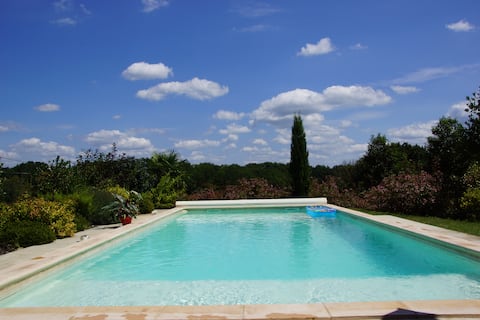 stone house with pool