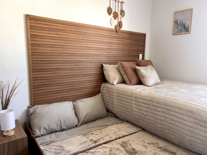Chambre trois avec 2 lits doubles