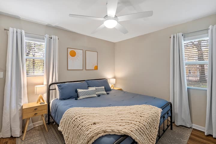  This spacious second bedroom offers a king-size bed for ultimate sleep comfort. Relax and sprawl out after a day of adventure. Built-in USP ports available on the night stand for easy electronic device charging. Blackout curtains installed! 